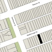 Irregular Lot 24.35' on Marlborough, 24.45' on Alley 424, 112' North-South (2,733 sf)